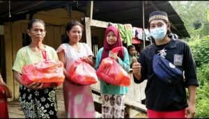 Wujud Kepedulian Dampak Pandemi Covid-19, PSHT Ranting Teluk Pandan Beri Bantuan Sembako