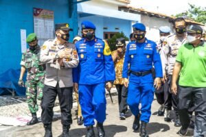 Sambut HUT Polairud ke-71, Polres Probolinggo Gelar Vaksinasi dan Baksos di Kampung Nelayan Tangguh Desa Randuputih