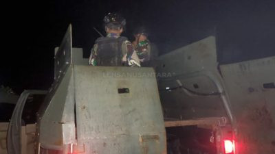 Ciptakan Rasa Aman, Satgas Pamtas Mobile Yonif Raider 514/SY Laksanakan Patroli Gabungan TNI-Polri