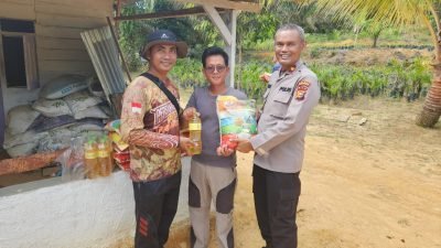 Polsek Kampar Kiri Berikan Bantuan Sosial kepada Masyarakat yang Kurang Mampu