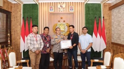 Kapolresta Denpasar Terima Penghargaan dari Manajeman Alfamart Cabang Bali
