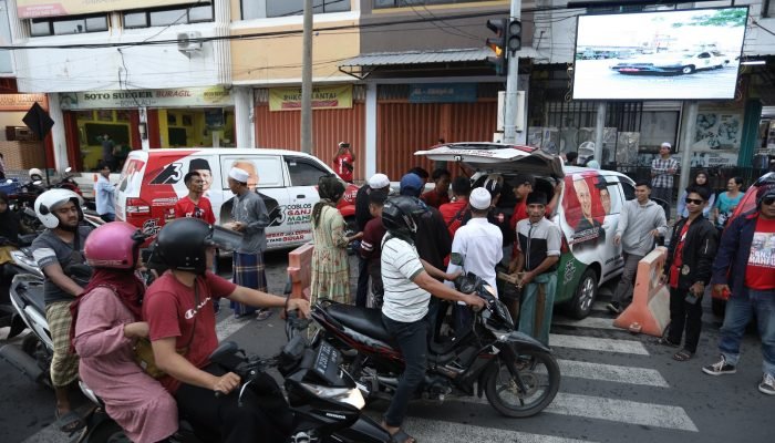 SMCC Disambut Hujan Deras di Pasuruan, Relawan Kobarkan Semangat Canvassing Ganjar Mahfud