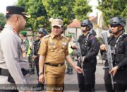 Pj Bupati Pasuruan Pimpin Apel Pergeseran dan Pengecekan Pasukan Pengamanan Pilkada 2024