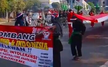 Kirab Merah Putih PNIB Di Jombang: Gema Kemerdekaan, Sambut Muktamar NU Ke-35 & Solidaritas Untuk Flores NTT
